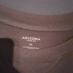 Balck Sweatshirt with cheetah print sleeve.